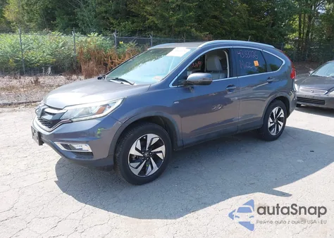 2016 Honda Cr-V Touring z USA, uszkodzony, nr VIN 5J6RM4H93GL108489